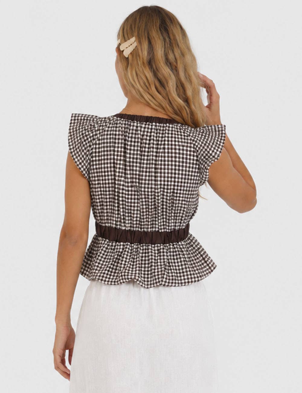 The Sutton Plaid Ruffle Sleeveless Bow Tie Peplum Top